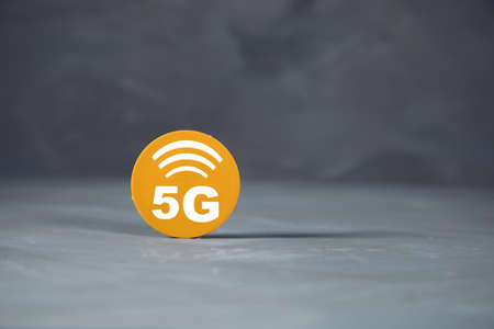 5G wifi sign on the table on gray background