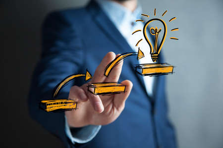 man hand staircase to success in business in screenの写真素材