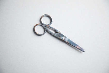 scissors on the white table background