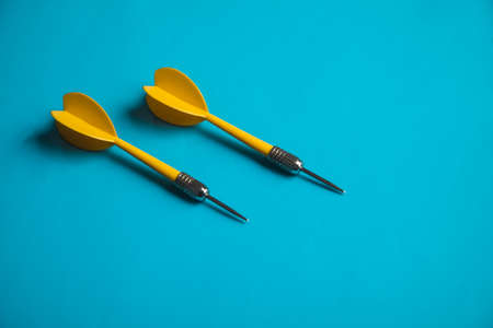 target arrow on the blue table backgroundの写真素材