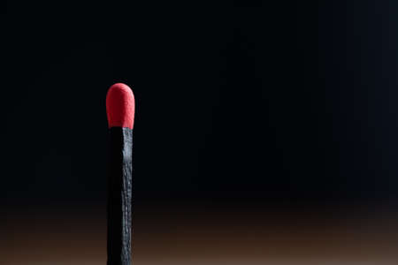 red match on the dark backgroundの写真素材