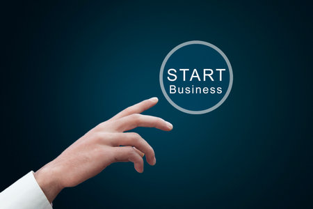 businessman touching virtual button start business