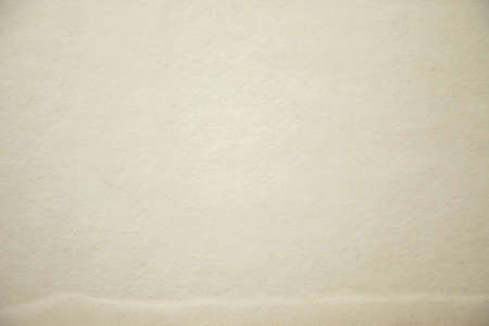Brown recycled paper texture as background.