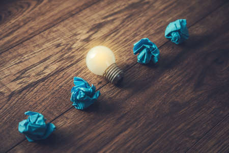 great idea concept with crumpled paper and light bulbの写真素材