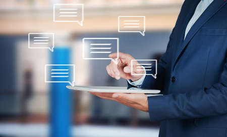 man with sms sign in the tablet screen