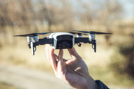 The modern drone and photographer man handsの写真素材