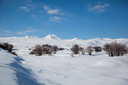 snowy Aragats mountain in Armenia under sky