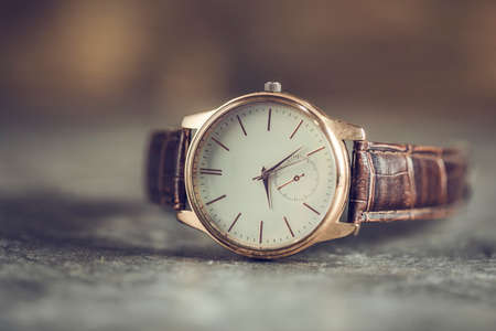 modern watch for man on the table backgroundの写真素材