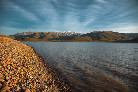 lake and mountain under beautiful skyの写真素材