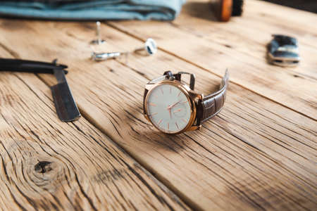 watch for man and shaving accessories on the tableの写真素材