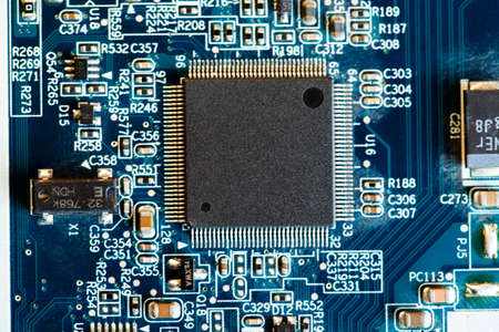 Electronic circuit board with processor, close up.