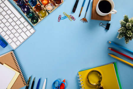 keyboard with notepad and stationary and coffeeの写真素材