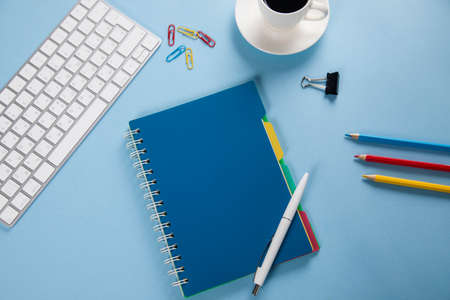 keyboard with notepad and stationary and coffee
