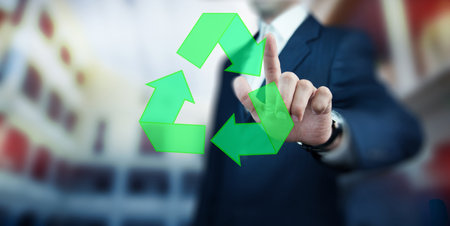 business man touching ecology concept in screenの写真素材