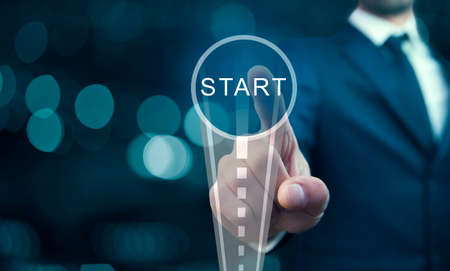 man touching start in the screen