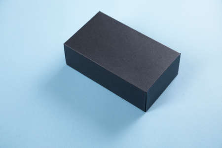 black box on the blue backgroundの写真素材