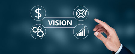 man touching vision text in the screenの写真素材