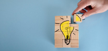 The concept of creative ideas innovative in business on wooden blocksの写真素材