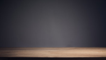 wooden table and dark wall backgroundの写真素材