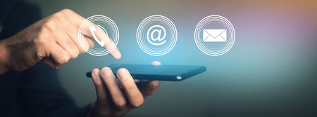 Man holding smart phone with social media icons