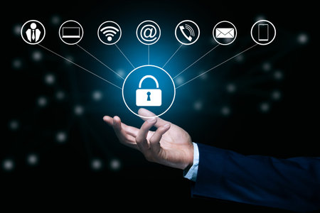 young business man holding lock icon.