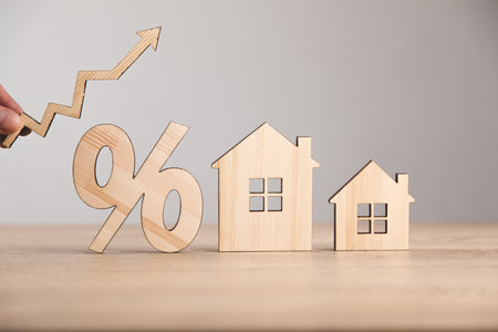man holding concept interest rates on mortgages.の写真素材