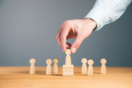 Business competition and leadership concept with wooden figuresの写真素材