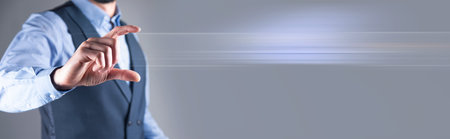 Man pushing on a touch screen interfaceの写真素材