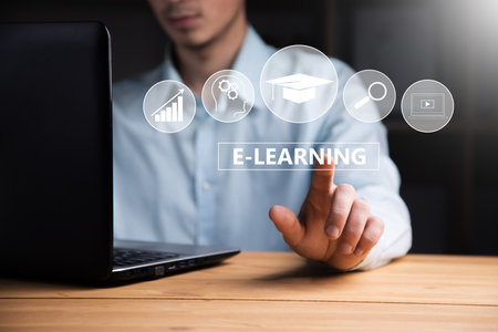 business man working computer and e-learning textの写真素材