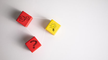 Concept creative idea and innovation. Wooden cube block with question mark and light bulb iconの写真素材