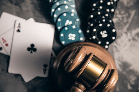 judge gavel and playing cards with chip