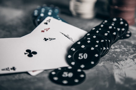 poker chips and aces on gray backgroundの写真素材