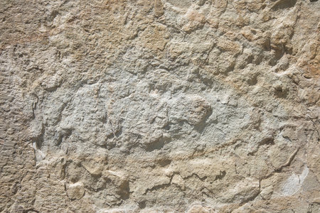 Texture of a stone wall. Old castle stone wall texture backgroundの写真素材