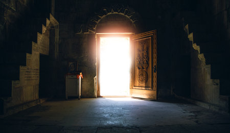 old opened door with light in retro styleの写真素材