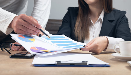 business and office concept - close up of chats and graphs in officeの写真素材