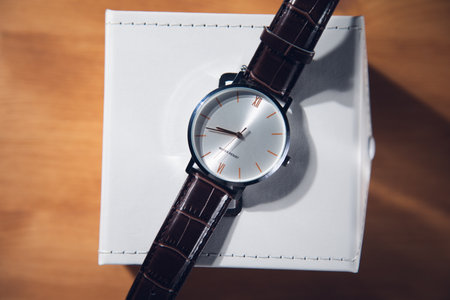 Water resist watch with white box.