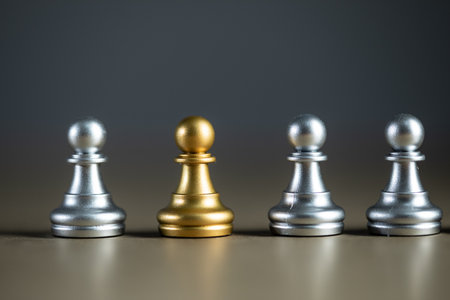 Gold and silver chess figures standing.の写真素材