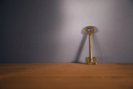 old vintage key on wooden table backgroundの写真素材