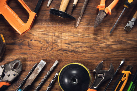 Different Tools on a wooden background.の写真素材