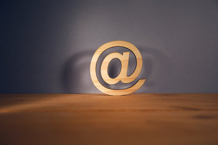email sign on wooden table. Concept e-mail message letterの写真素材