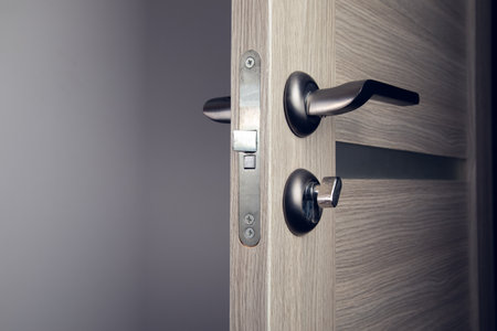 Close-up half opened door. Wooden doorの写真素材