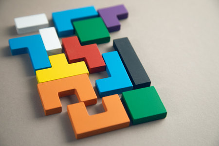 different colorful shapes wooden blocks. Geometric shapes in different colors.の写真素材