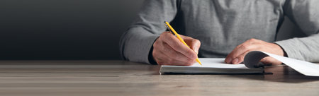 business man hand is signing a contract In the agreementの写真素材