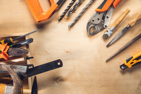 Working tools on wooden rustic background. top viewの写真素材