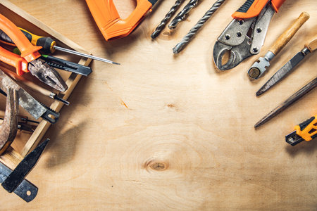 Working tools on wooden rustic background. top viewの写真素材
