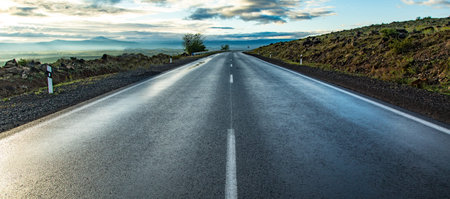 High speed road with cloud background.