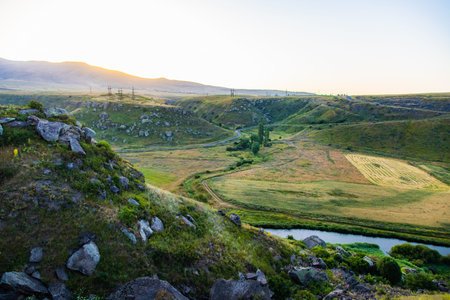 Summer mountains green grass and blue sky landscape.の写真素材