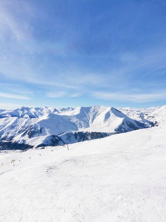 Ski resort. View of snowy slope and years. Winter recreation. Gudauri Georgiaの写真素材
