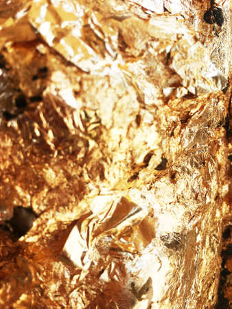Texture of the gold leaf, Gold background, Picture from Buddha image Back.