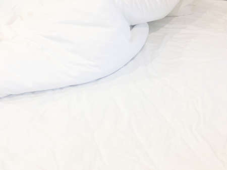 White Pillow On Bed And With Wrinkle Messy Blanket In Bedroom, From Sleeping In A Long Night Winter.